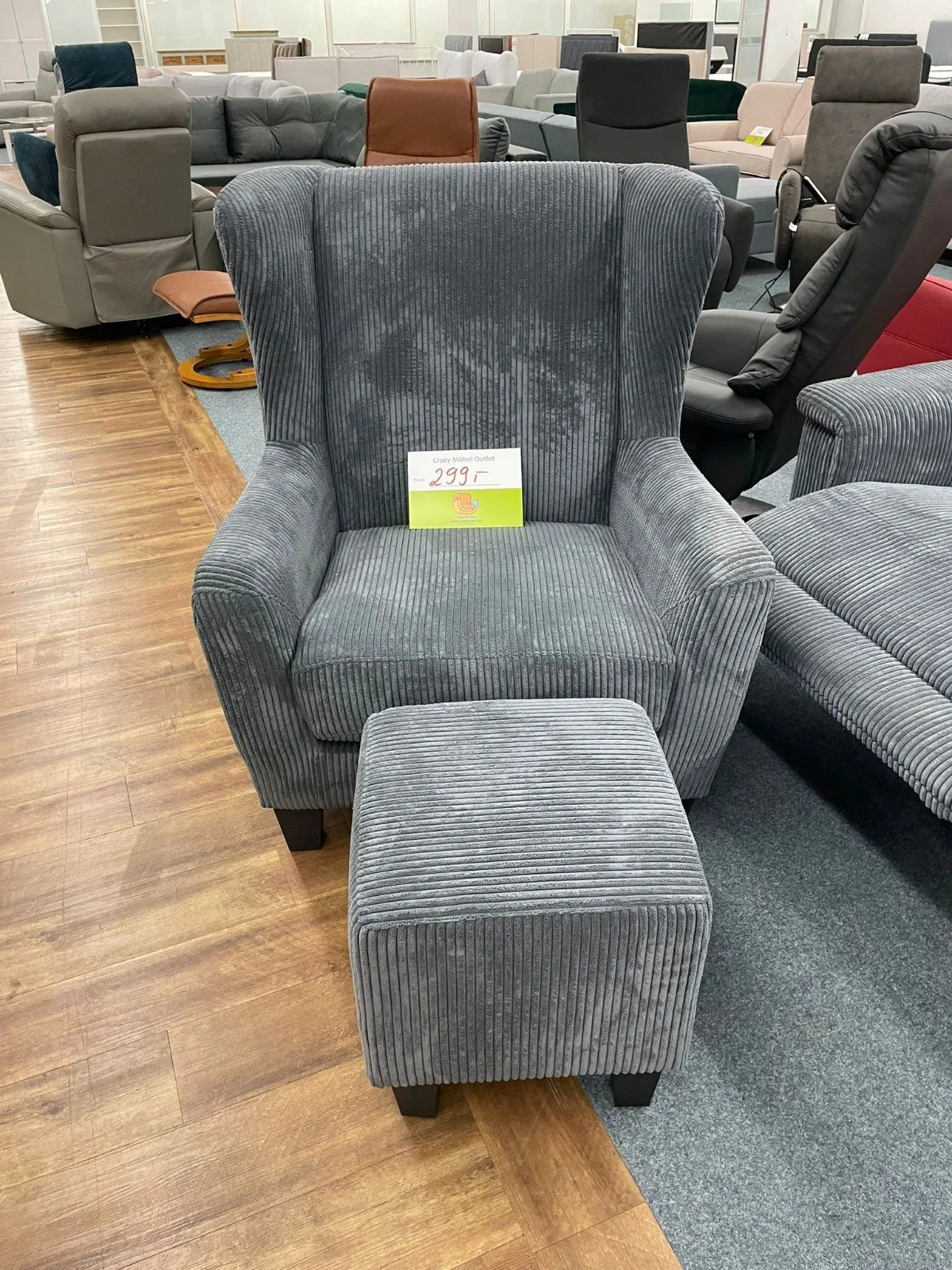 Eleganter Cord-Sessel mit Hocker - Grau