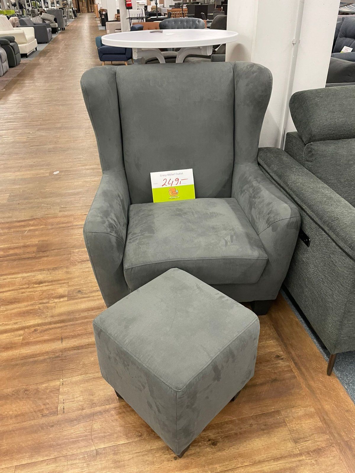 Eleganter Sessel mit Hocker - Grau